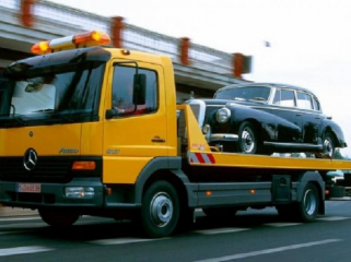 Услуги эвакуатора, автовоза. Доставка авто из порта Одессы-Гадяч